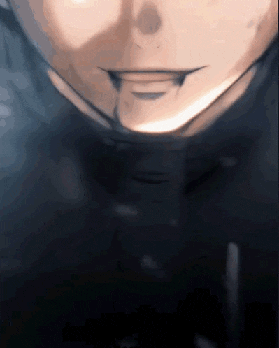 a close up of a person 's face with a smile on their face