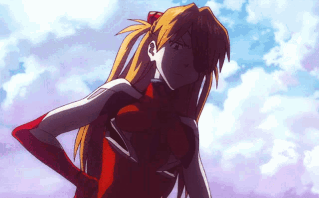 a girl with long blonde hair is standing with her hands on her hips in front of a blue sky
