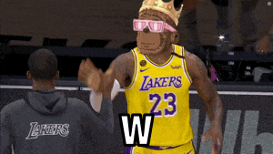 a lakers player wearing a crown and sunglasses giving another player a high five