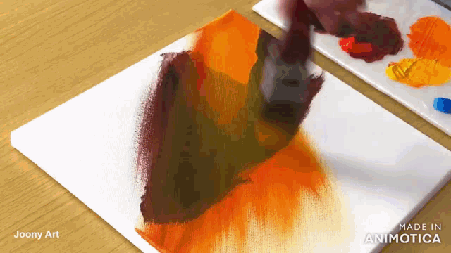 a painting being made by joony art is shown