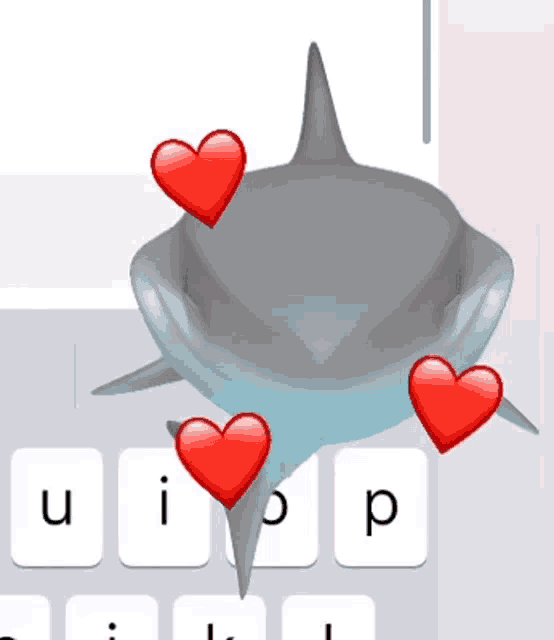 a shark is surrounded by red hearts on a keyboard with the letters ui and p