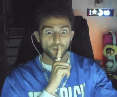 a man wearing a blue shirt that says ' dicy ' on it