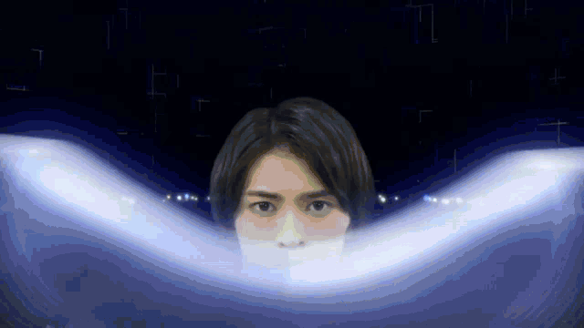a close up of a person 's face with a mask on it