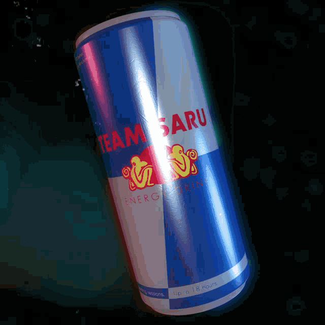 a can of team saru energy drink against a dark background