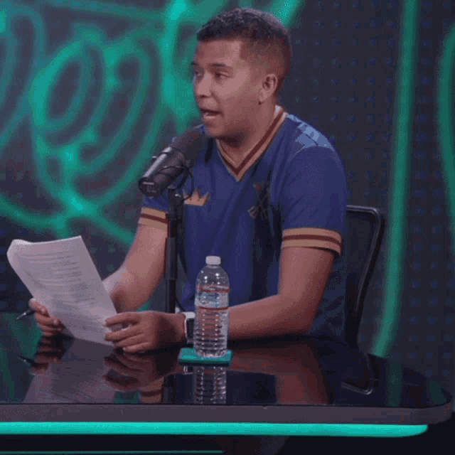 a man sitting in front of a microphone with the words i 've never even heard about this game