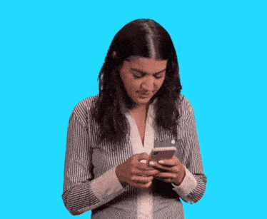 a woman in a striped shirt looks at her phone with a blue background and the words " lo " and " rai " above her