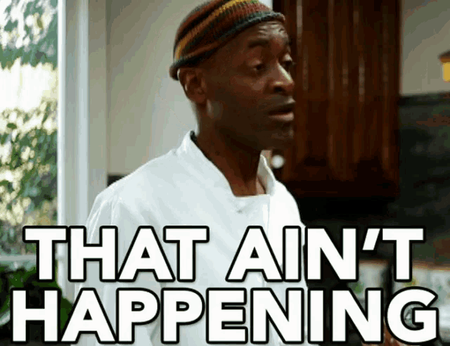 a man in a kitchen with the words that ain 't happening