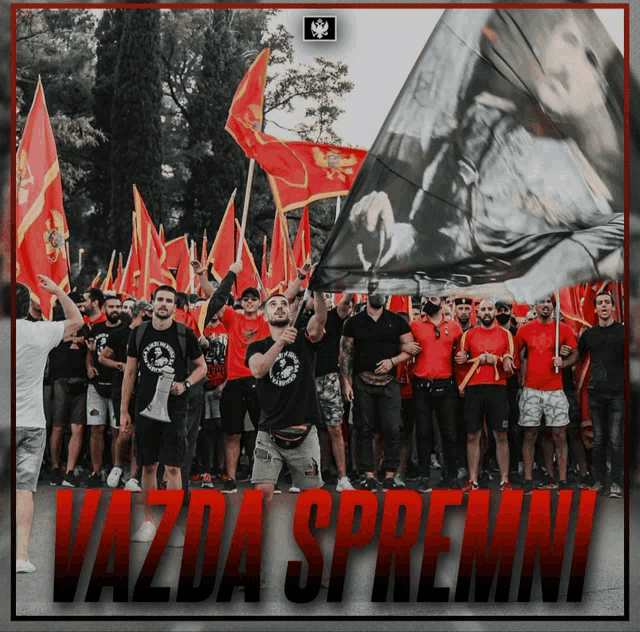 a group of people holding flags with the words vazda spremni written on the bottom