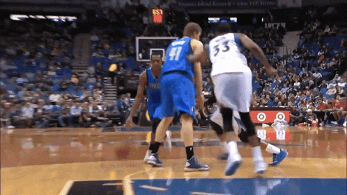a basketball player in a blue jersey with the number 41