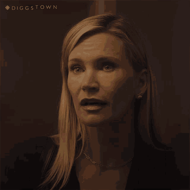 a close up of a woman 's face with the hashtag #diggstown on the bottom