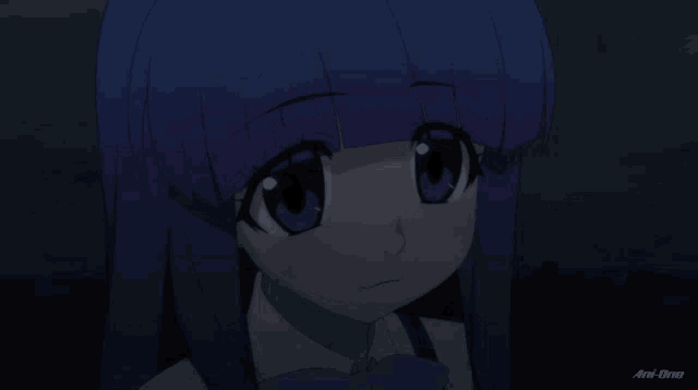 a girl with purple hair is smiling in a dark scene