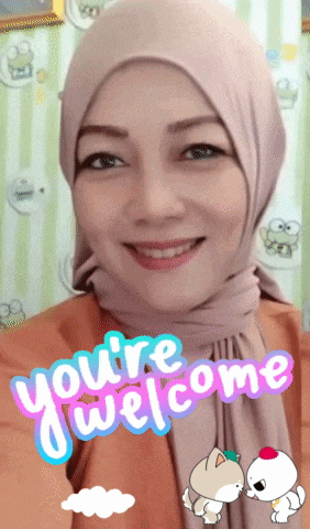 a woman wearing a hijab is smiling with the words " you 're welcome " below her