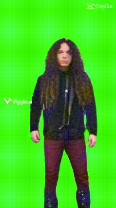 a woman with long hair is dancing in front of a green screen