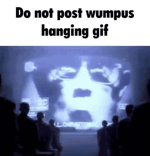 a group of people are watching a hanging gif of a man 's face