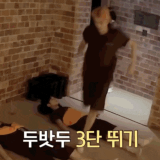 a person is laying on the floor with a brick wall behind them and the words 3 on the bottom right