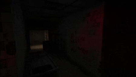 a dark room with a sink and a red light on the ceiling .