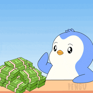 a penguin is sitting in front of a stack of money