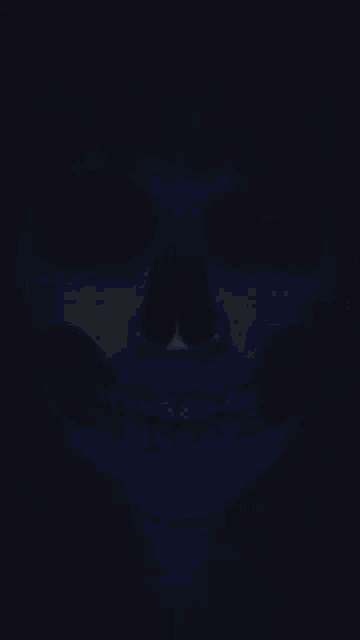 a drawing of a skull with green spots on it