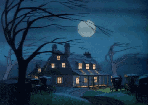 a house with a full moon in the sky