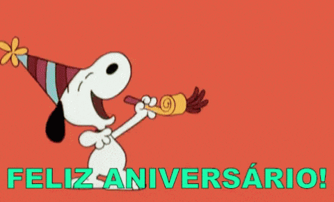 a cartoon of snoopy blowing a party horn with the words feliz aniversario on the bottom
