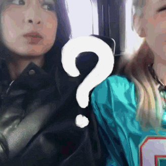 two women sitting next to each other with a question mark in the middle