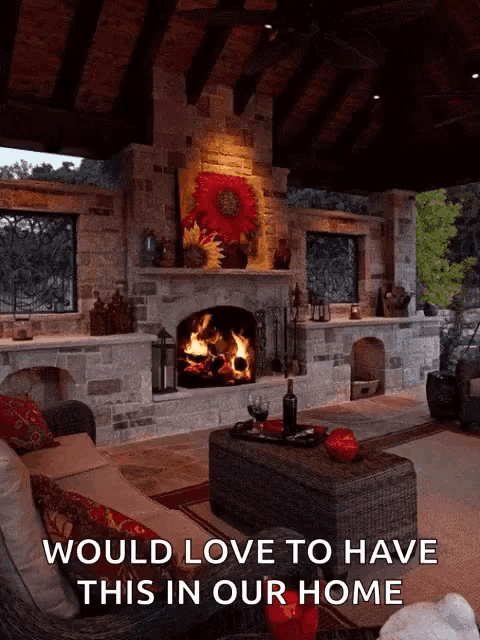 a picture of a living room with a fireplace that says would love to have this in our home