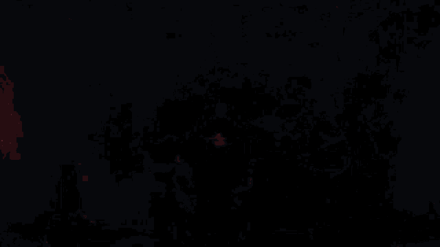 a pixel art of a person 's hands with red glowing nails