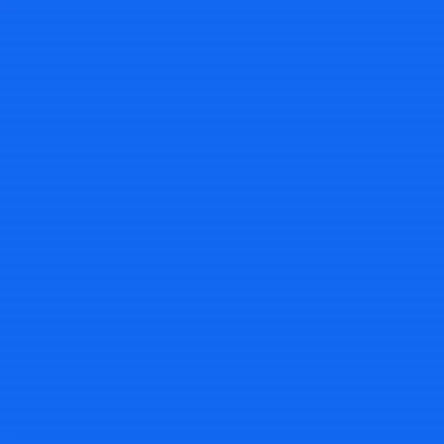 a close up of a blue background with a plain texture .
