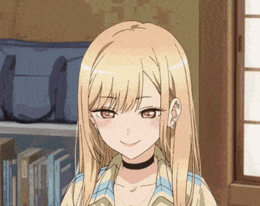 a girl with blonde hair and red eyes is smiling