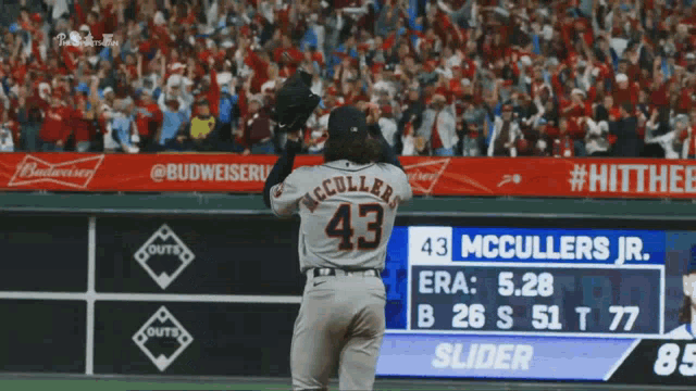 a baseball player wearing a jersey with the number 43
