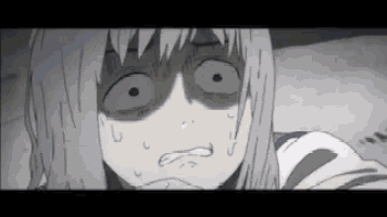 a close up of a cartoon character 's face with a shocked expression .