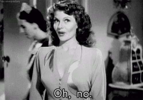 a black and white photo of a woman saying oh , no