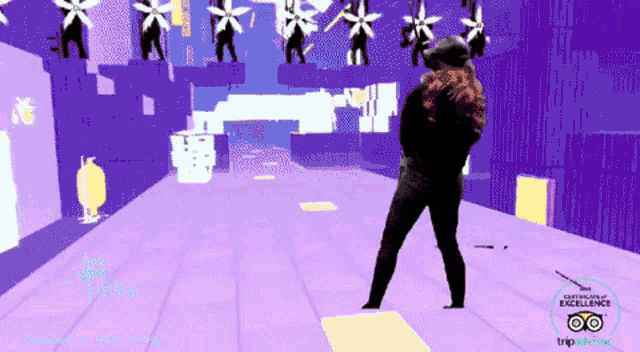 a woman is dancing in a video game with a tripadvisor logo
