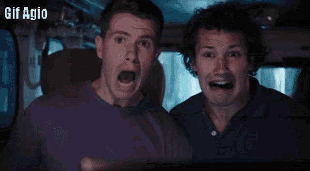 a gif of a person sitting in a car with the words gif agio below them