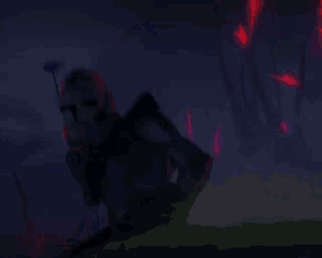 a storm trooper is holding a light saber in his hand in the dark .