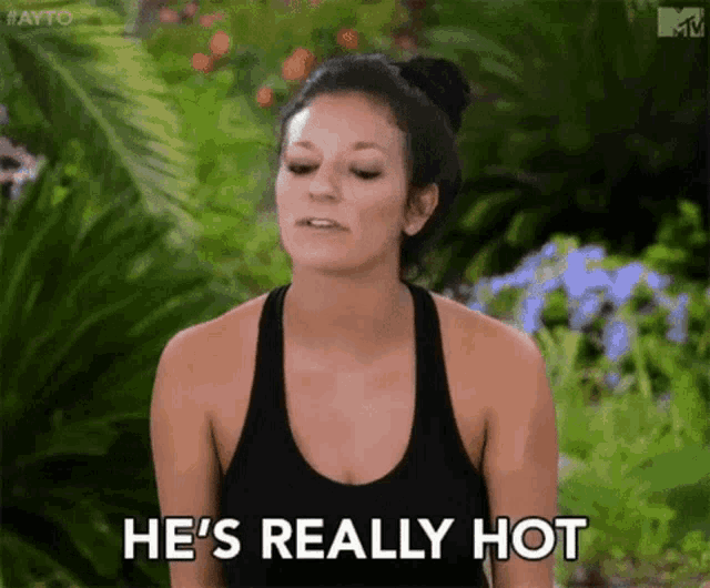 a woman says he 's really hot in front of a jungle