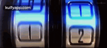 a close up of a slot machine with the numbers 1 and 2 visible