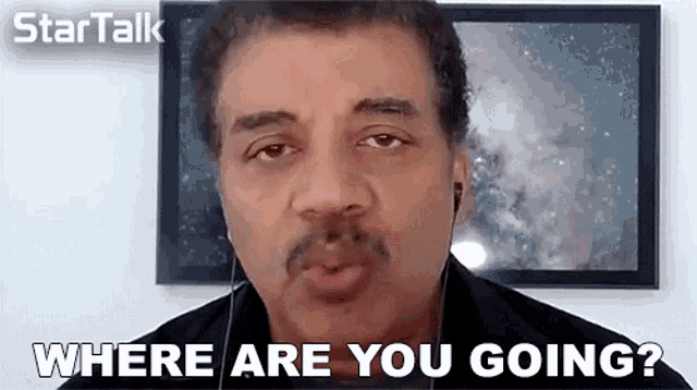 a man with a mustache and ear buds is asking where are you going
