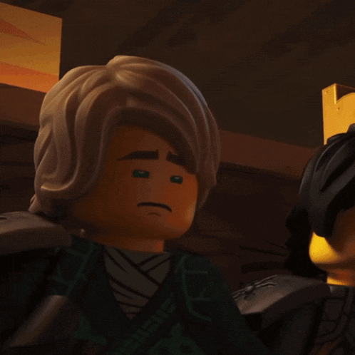 a lego character is sitting at a desk with a box in front of him and a sign that says box-tax