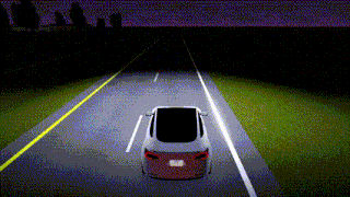 a car is driving down a road at night with a license plate that says ' a ' on it