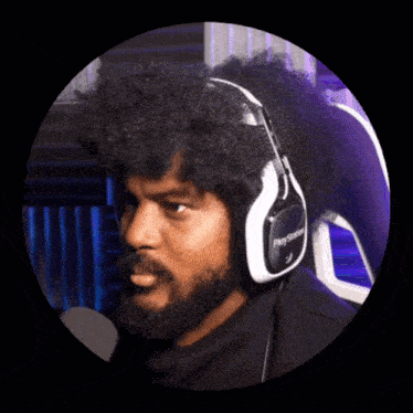 a man wearing headphones that say playstation on them