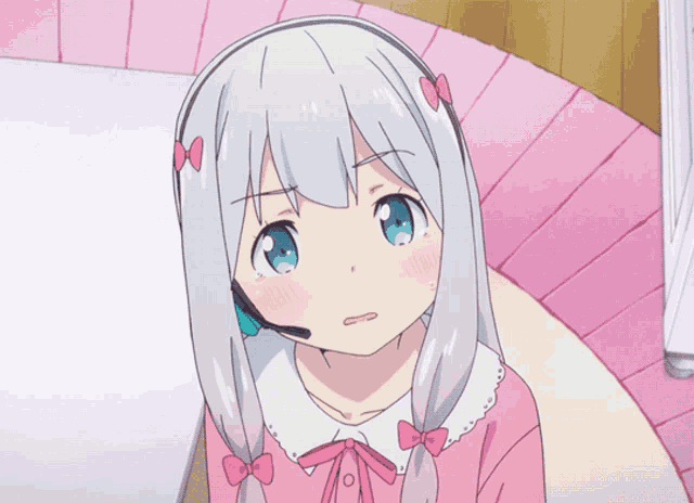 a girl with gray hair and a pink shirt has a headband on her head