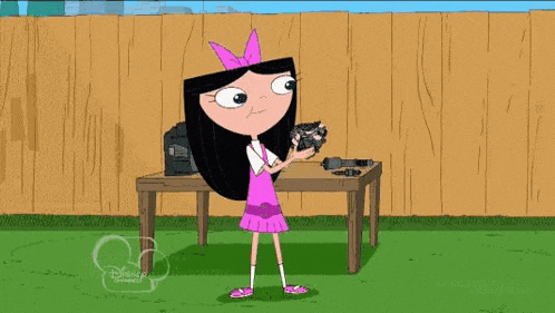 a cartoon girl is holding a camera in front of a table .