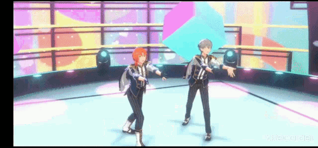 two anime characters are dancing on a stage in a video game .