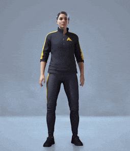 a woman in a black and yellow outfit with the letter a on her shirt