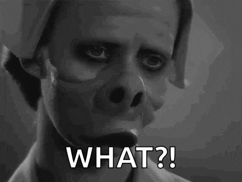 a black and white photo of a man with a pig nose and the words `` what ? '' .