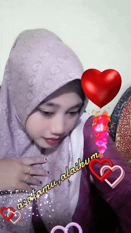 a woman wearing a hijab is surrounded by hearts and the words assalamu alaikum