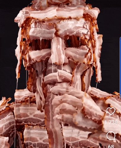 a statue of a man made of bacon with the number 1738 on the bottom