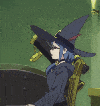 a witch with glasses and a hat with a c on it
