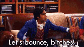 a man is sitting on a couch and saying let 's bounce bitches